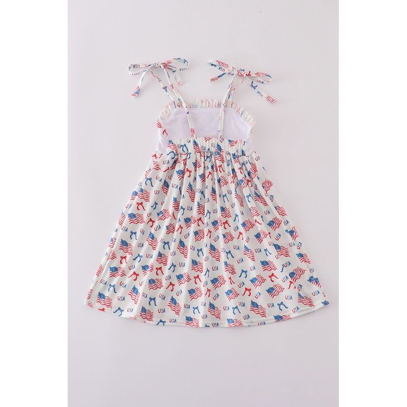 Dress with American flag pattern on a light gray background