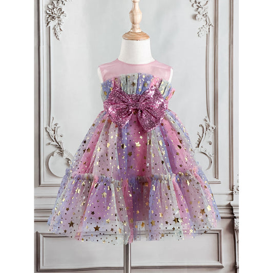 pink tulle dress with pink bow with sequins in the front, gold stars throughout the dress, see through pink mesh at the very top of dress, has light purple, light green colors