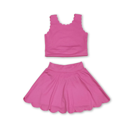 pink top with scallop detailing with a skort that has scallop detailing at the bottom hem, 2 piece set
