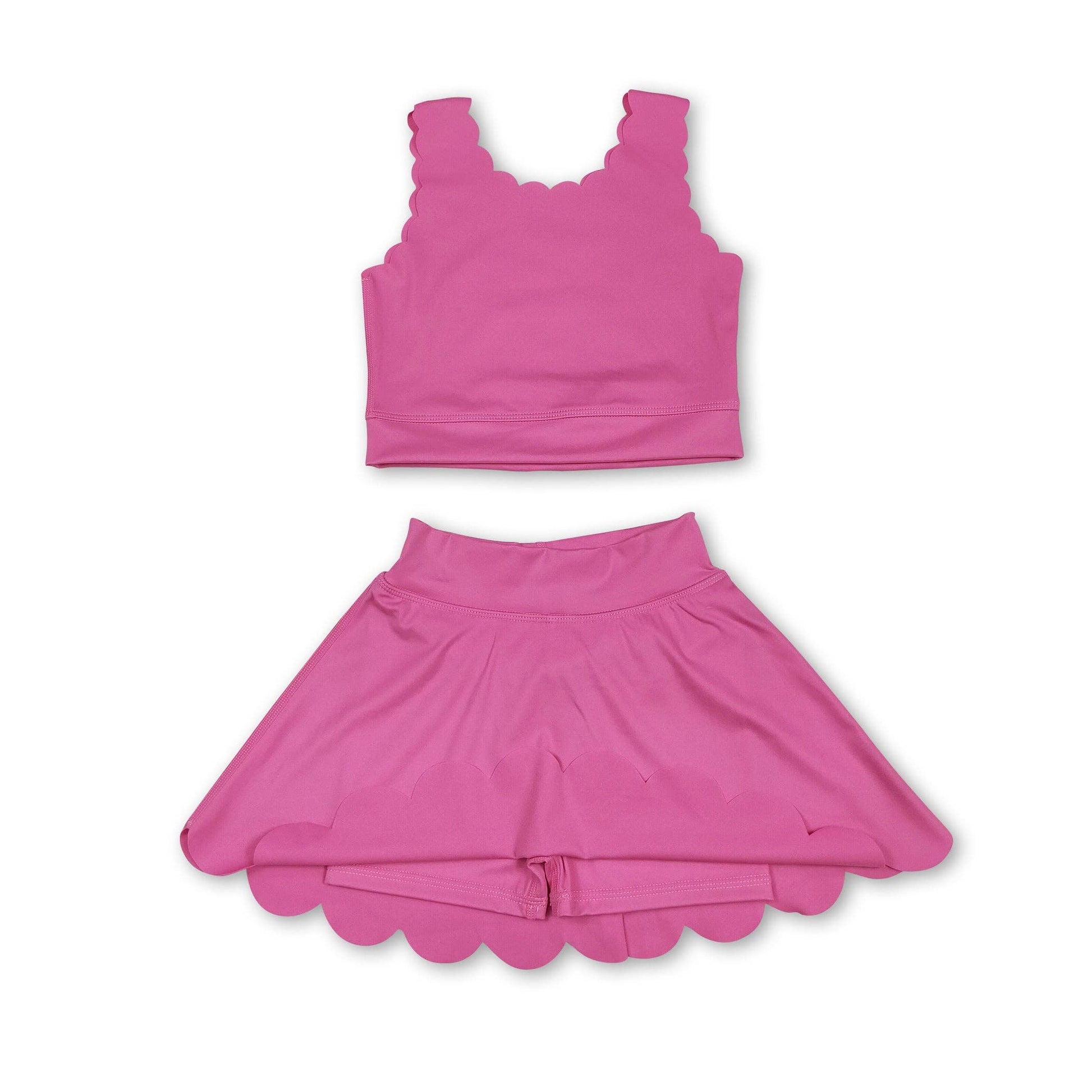 pink top with scallop detailing with a skort that has scallop detailing at the bottom hem, 2 piece set