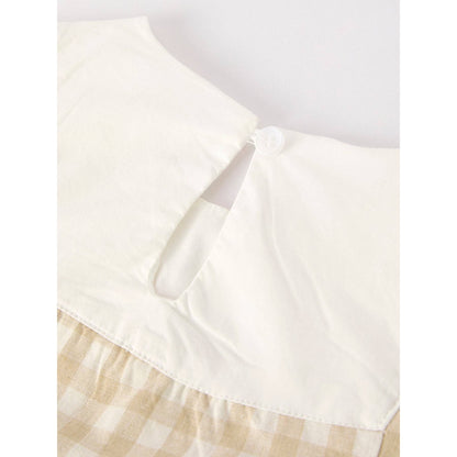 girls Easter bunny embroidered gingham dress, vintage style, beige, neutral colors, aesthetic, hanging on hanger on a neutral background, flowy skirt design on dress