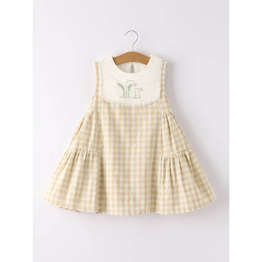 girls Easter bunny embroidered gingham dress, vintage style, beige, neutral colors, aesthetic, hanging on hanger on a neutral background, flowy skirt design on dress