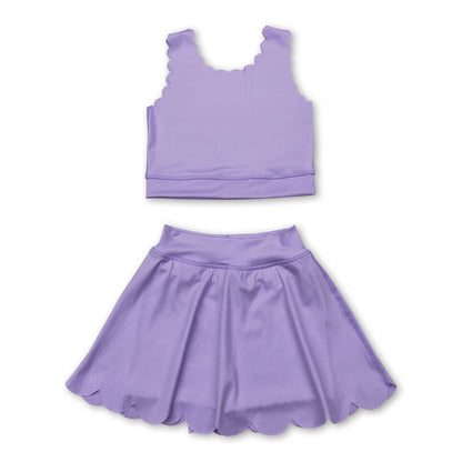 purple tank top with scallop detailing with a skort that has scallop detailing at the bottom hem, 2 piece set