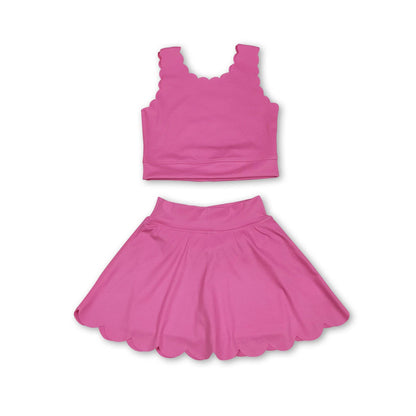 pink top with scallop detailing with a skort that has scallop detailing at the bottom hem, 2 piece set